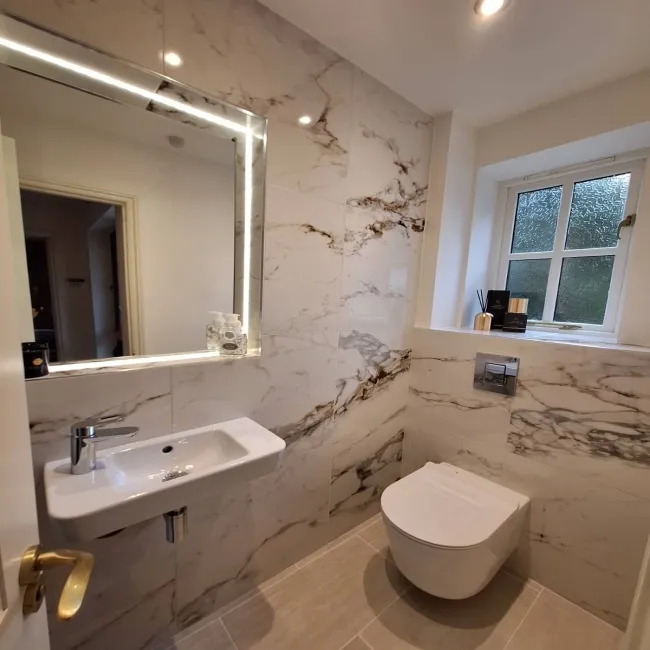 Barnaby White Marble Effect Gloss Rectified Vitrified Ceramic Floor Tile