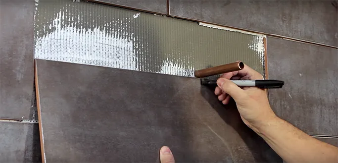 How-to-Set-and-Drill-Tiles-for-Pipework-Video-1