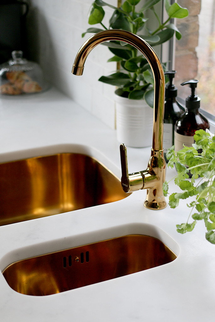 Clean kitchen sink and tap